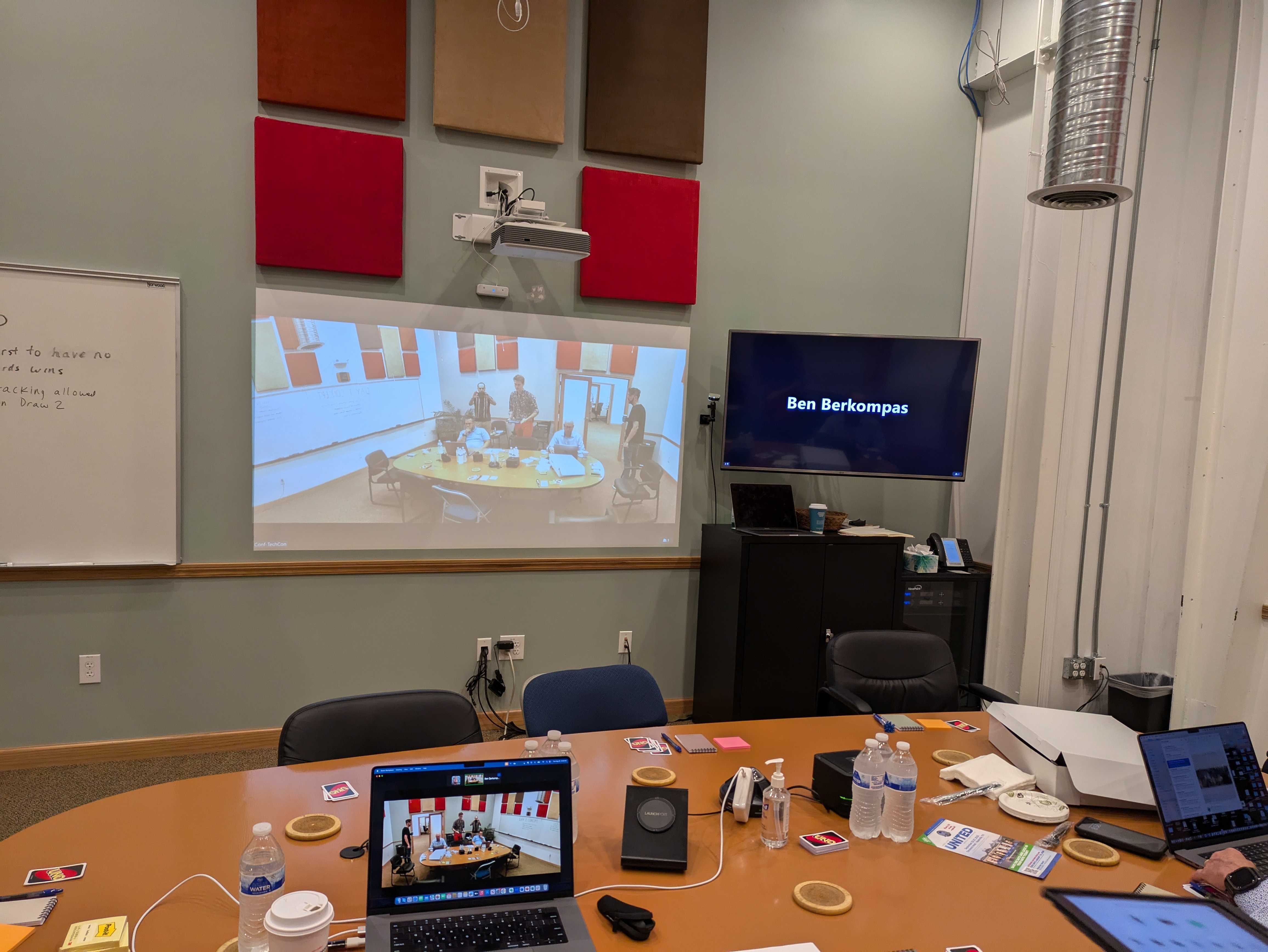How the meeting room was set up for virtual and in-person attendance